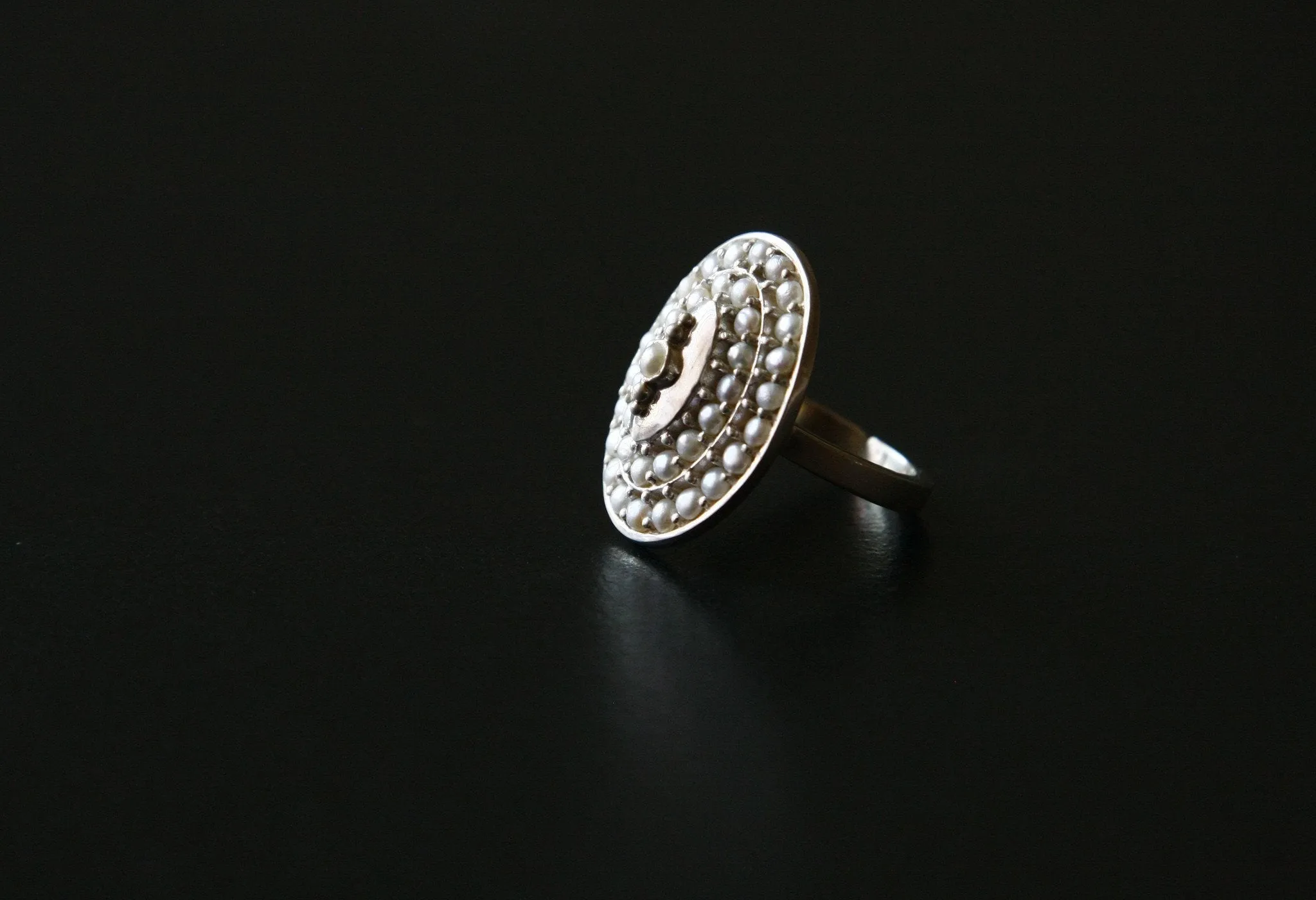 Classic and chic, pearl encrusted oval ring