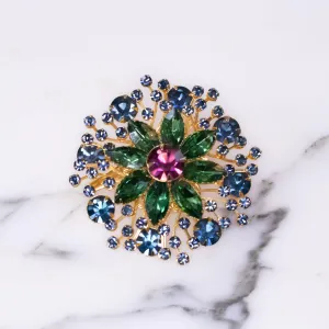 Vintage Jewel Tone Medallion Brooch with Emerald Green, Vibrant Amethyst, and Royal Blue Rhinestones